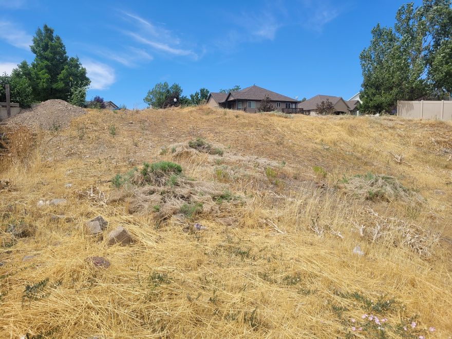 This prime building lot lies on a quarter acre and features unobstructed mountain and valley views. Potential for a walkout basement. The lot is already stubbed for water, power, and sewer. There is a soccer sports complex and a small, shallow lake to the north of the property. Take advantage of Santaquin Canyon and hiking trails in the mountains to the east. Buyer to verify all information.