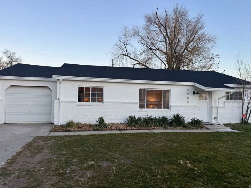 Beautifully remodeled 3 bedroom 2 bathroom home with electric fireplace, new kitchen cabinets, stove, dishwasher, microwave, faucet, flooring and more. Primary bedroom has it's own bathroom with walk-in closet. New central air and new furnace, new roof, attached garage. New doors and hardware.Too many amazing features to list them all. Come and see for yourselves! Open house Saturday, December 13 from 10-1.