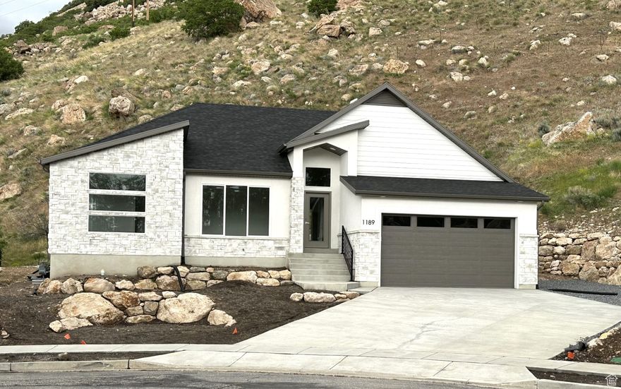 RENT/LEASE TO OWN AVAILABLE! Call for more details. Stunning Rambler with Modern Accent Architecture 4 Bedrooms | 3 Bathrooms | 2-Car Garage + RV Parking  Discover the unique, modern design of Accent Homes in this beautiful rambler offering the perfect balance of luxury and value. With 3,315 sq. ft. total living space including a main floor of 1,665 sq. ft. and a spacious basement of 1,650 sq. ft. (with 360 sq. ft. finished), you'll have plenty of room to live, work, and play.  Situated on a generous .31-acre lot (13,337 sq. ft.), this home features a two-car garage plus dedicated RV parking for your toys or guests.  Enjoy nature and adventure with ski resorts just 30 minutes away-the perfect blend of convenience and lifestyle.