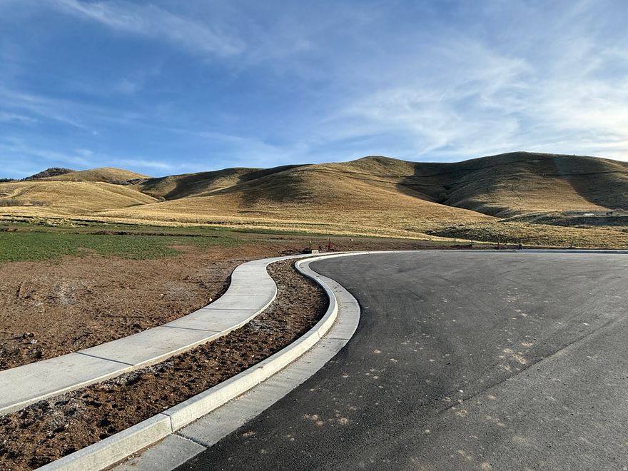 Big Dreams Development is proud to offer this fully improved State Of The Art view Lot. This lot has full city approved tax Id to start building your dream home. Yes this lot has all utilities, tooele city water connection, etc. Sellers are custom builders. Buyers have the option to have sellers build a new custom home on this lot for them. We have very affordable preferred 0$ construction loans with permanent financing available. No Hoa, Amazing foothill, mountain, city & lake views.