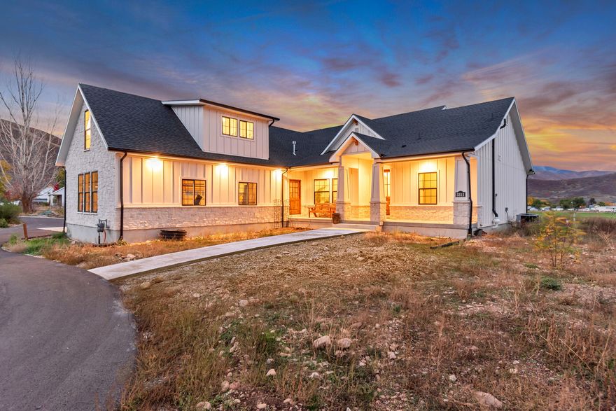 Breathtaking 6.2-Acre Estate with Panoramic Mt. Timpanogos Views!  Welcome to your dream property, where every day feels like a postcard. This newly built 2023 home sits on 6.2 private acres with the best view of Mt. Timpanogos in Utah, just 2 minutes from Deer Creek Reservoir.  The 9-bedroom, 5-bath residence offers spacious living designed for comfort and flexibility. It features a large family room and kitchen with hidden pantry, perfect for gathering and entertaining. The main living space has a master bedroom on the main floor, 7 bedrooms total, and a bonus room upstairs! The home also is equipped with large storage rooms, a water softener, filtration system for the well, fiber internet and gas hook-ups for future fireplaces and appliances.   The downstairs 2 bedroom, 2 bathroom apartment features private exterior stairway access and generates approximately $2,000/month, ideal for guests, extended family, or rental income.  Enjoy a horseshoe driveway with a roundabout, 3-car garage, private well, and septic system already in place. Property includes 2 irrigation water shares (with more available for purchase) and an easement for irrigation water access, perfect for maintaining gardens, orchards, or livestock such as horses, cows, and chickens.  Located in the heart of Utah's recreation paradise, you're just minutes from world-class ski resorts, Deer Creek Reservoir, and blue-ribbon fly fishing, with Park City less than a scenic half-hour drive away.  This property is approved to subdivide into 3 lots, offering incredible investor potential or the opportunity to create a private family estate.   Whether you're seeking a peaceful homestead, an income-producing estate, or a rare long-term investment, this property delivers unmatched views, flexibility, and location.  Square footage figures are provided as a courtesy estimate only and were obtained from county records.  Buyer is advised to obtain an independent measurement.  Matterport tour attached