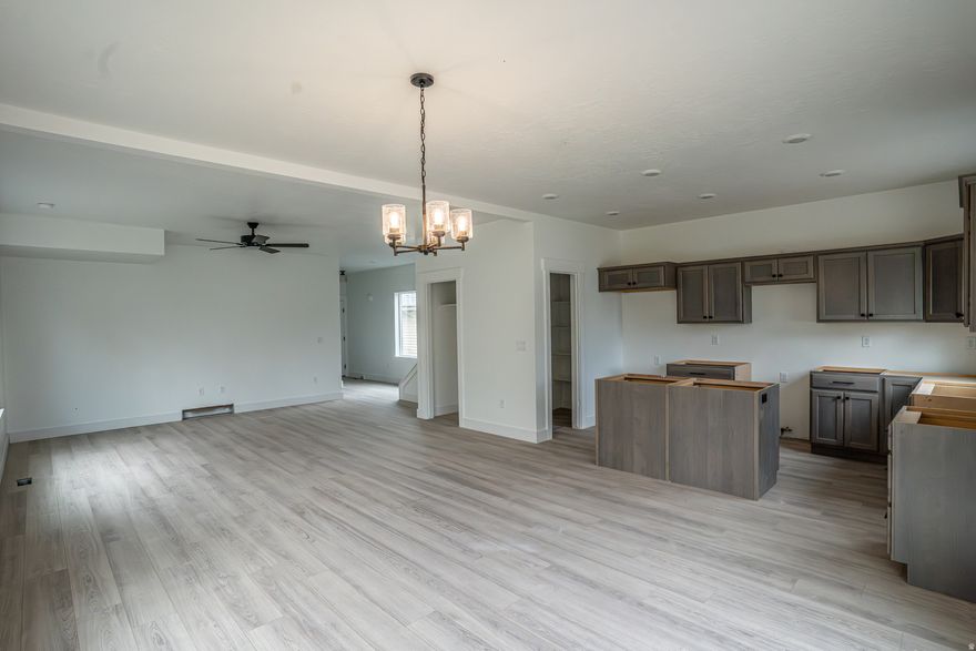 ***OPEN HOUSE Sat. April 18th, 10-10:30 am*** LOWEST PRICED NEW CONSTRUCTION DETACHED HOME IN ALL OF SALT LAKE COUNTY WITH NO HOA, featuring a SPACIOUS YARD!!! Quick move in! Act NOW!  3-bed, 2-story home (with laundry close to bedrooms), all with WALK IN CLOSETS. Home features CHEF'S KITCHEN: expansive kitchen island, w/WALK IN pantry & STAINLESS STEEL appliances.  Owner's suite features HUGE walk in closet, dual sinks, & oversized shower. Elegant QUARTZ in kitchen & baths, upgraded waterproof LVP throughout, & 9-foot ceilings on the main. LOCATION! EASY distance to SR-201 for easy commute.  Buyer/Agent to verity all, sq footage per building plans.