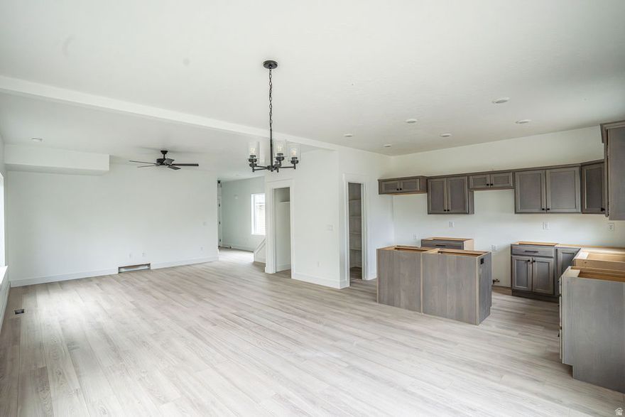 ***OPEN HOUSE Sat. April 18th, 10-10:30 am*** LOWEST PRICED NEW CONSTRUCTION DETACHED HOME IN ALL OF SALT LAKE COUNTY WITH NO HOA, featuring a SPACIOUS YARD!!! Quick move in! Act NOW!  3-bed, 2-story home (with laundry close to bedrooms), all with WALK IN CLOSETS. Home features CHEF'S KITCHEN: expansive kitchen island, w/WALK IN pantry & STAINLESS STEEL appliances.  Owner's suite features HUGE walk in closet, dual sinks, & oversized shower. Elegant QUARTZ in kitchen & baths, upgraded waterproof LVP throughout, & 9-foot ceilings on the main. LOCATION! EASY distance to SR-201 for easy commute.  Buyer/Agent to verity all, sq footage per building plans.