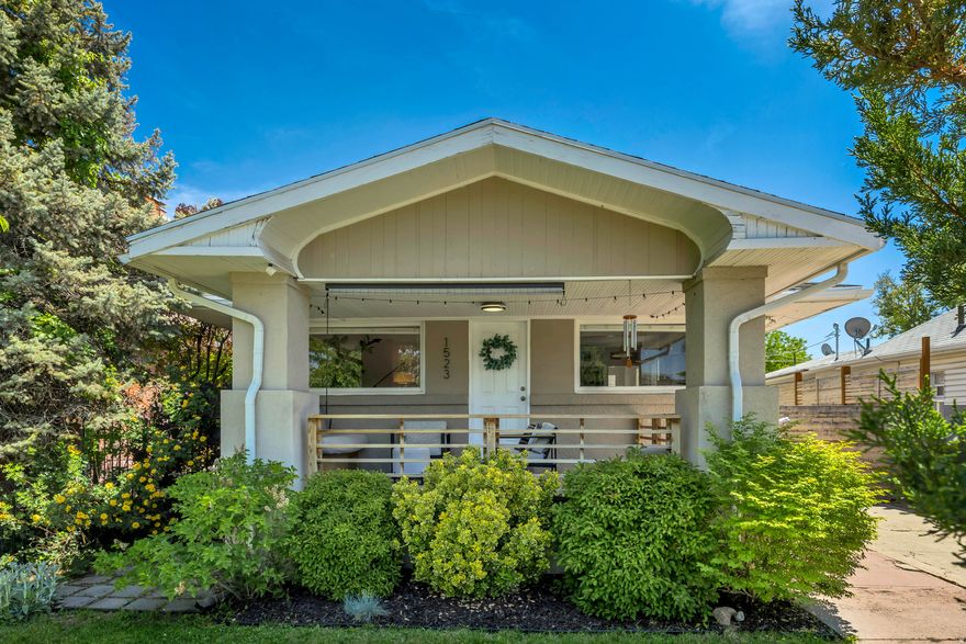 Located in a quiet, highly desirable neighborhood near Liberty Park, this charming bungalow blends character with thoughtful updates and functionality. A quintessential Sugar House front porch welcomes you into a bright, clean interior featuring a cozy fireplace, newer windows, two main-level bedrooms, and a full bath on the main floor. The basement expands the living space with a third bedroom, dedicated laundry area, and exceptional storage. Outside, the newly built deck and beautifully landscaped yard create the perfect setting for entertaining/peaceful retreat, with the sellers offering a credit for backyard sod installation to complete the space. The true standout is the  2-car garage with abundant storage, built-in workbench, and attached rear shed area - a rare and valuable feature for this area. With a newer roof, furnace, and water heater already in place, this turnkey Liberty Park bungalow is full of warmth, charm, and everyday practicality. Welcome Home!