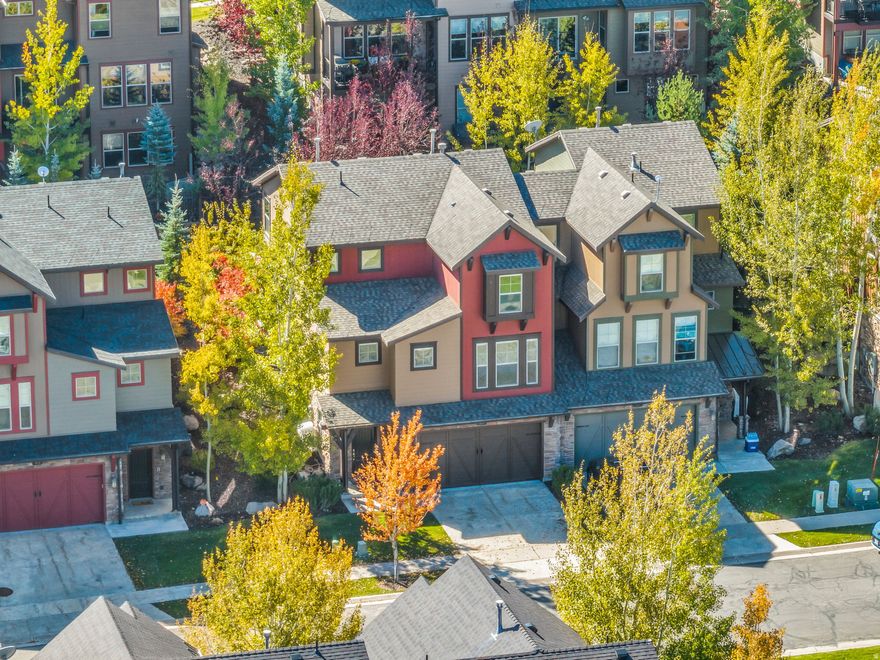 Welcome to this beautifully refreshed townhome in The Retreat at Jordanelle, where thoughtful design meets effortless mountain living. Featuring an open and airy layout with soaring vaulted ceilings, this residence impresses with modern finishes and abundant natural light throughout. Sold fully furnished, it's ideal as an investment property, mountain getaway, or move-in ready for a full-time residence.  Recent upgrades elevate the home's style and function, including all-new flooring, fresh paint, sleek countertops, and newly stained cabinetry. Step outside to the pergola-covered patio with privacy fencing, making it a perfect retreat for outdoor dining or your morning coffee. The extended garage provides ample room for vehicles, gear, and storage, making it as practical as it is inviting. Positioned in one of the most convenient locations within the community, this home offers quick access to the clubhouse and amenities, featuring a seasonal pool, year-round hot tub, fitness center, and a 15-acre park with walking trails and a picnic pavilion. With nightly rentals permitted and a prime location just minutes from Park City, the New Deer Valley East Village, and Jordanelle Reservoir, this property offers exceptional versatility for lifestyle and investment alike. Experience mountain living at its best in one of the area's most desirable and well-appointed communities.