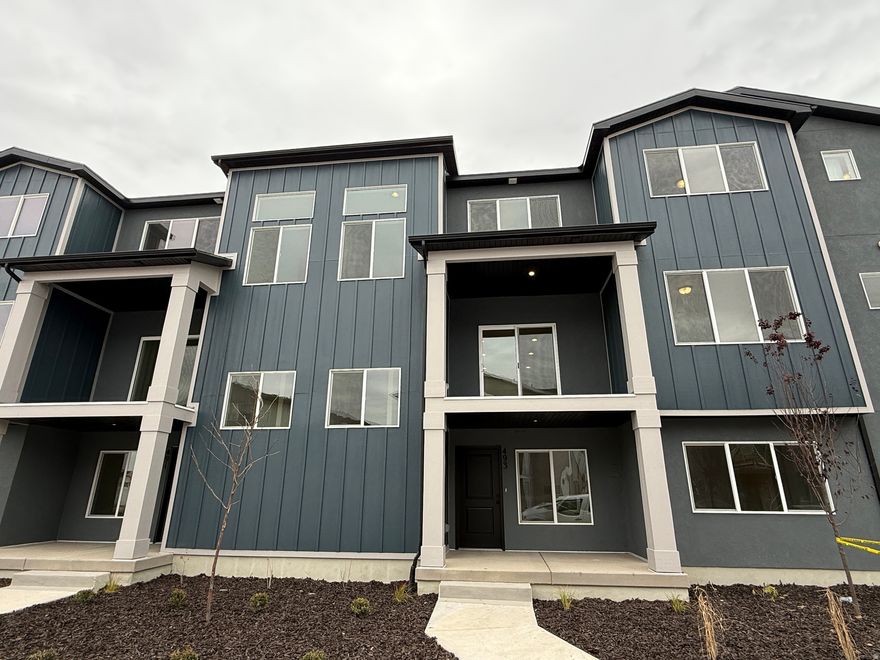 UNDER CONSTRUCTION - NOV Completion! The Highgrove plan from Woodside Homes is nestled in a highly sought after neighborhood, close to Frontrunner, shopping, freeway access and recreation. This home features 9' ceilings on the second floor, black metal railing throughout the home, White cabinets with White Quartz tops. Water proof wood laminate, 2-tone paint, tankless water heater & more! This home has a large front porch, as well as an oversized covered deck just steps from the dining nook. The open family/dining/kitchen space is perfect for entertaining friends & family. The first floor has a flex space - great for home office or second family room, with tons of storage and closets throughout. Call/Text to see this home and other move in ready homes in Meadowbrook. UNDER CONSTRUCTION- NOV Completion. Don't forget to ask about our amazing preferred lender incentives to make your dream of homeownership a reality. # 403 Highgrove. Photos are of different unit - colors/finishes/upgrades may vary from photos.