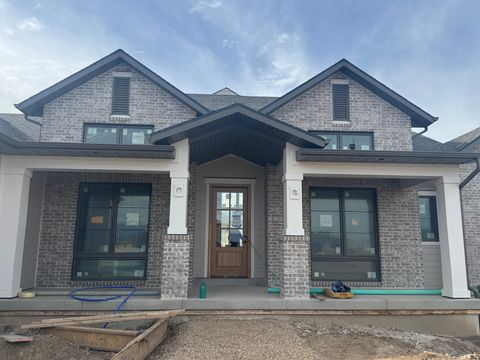 Photo of 13352 S HOLLYS POND LN #10, Herriman, UT 84096 (MLS # 2122500)