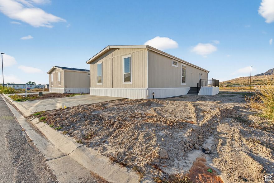 Welcome to your brand new, never-lived-in home in a beautiful new community. This 4-bedroom, 2-bathroom home combines comfort, style, and affordability, making it a great option whether you're stepping into homeownership for the first time or downsizing. The open layout features a large kitchen island, modern finishes, and an plenty of natural light that fills every room. With its thoughtful layout and high-quality details, you'd never guess it's a mobile home! Plus, with a clubhouse and pool expected to be completed in the spring, you'll enjoy even more amenities and comfort right outside your door. Don't miss the chance to own this brand new, affordable home in a growing community.