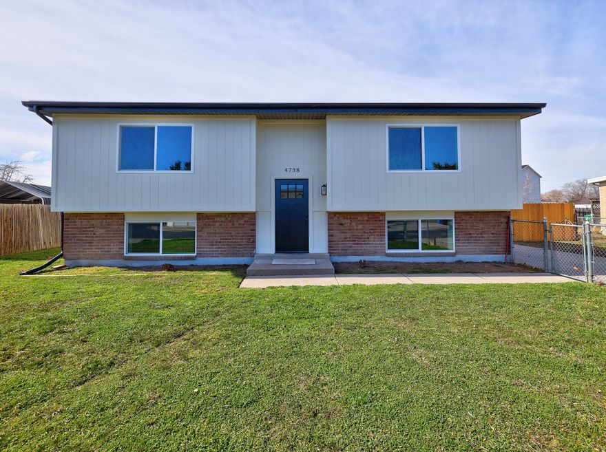 This home is move-in ready! Extra kitchen for extra income with separate private entrance. New roof! Nothing left untouched with all major upgrades including all new HVAC. 4 bedroom 2 bath with an extra kitchen. Great open layout with lots of natural lighting thanks to the new windows. Kitchen has been upgraded with custom shaker cabinets, waterproof flooring, quartz countertops and all new stainless appliances that are included! Large lot with private backyard deck for entertaining. Home offers plenty of parking! Home has had all the major upgrades done that you won't find in this area.