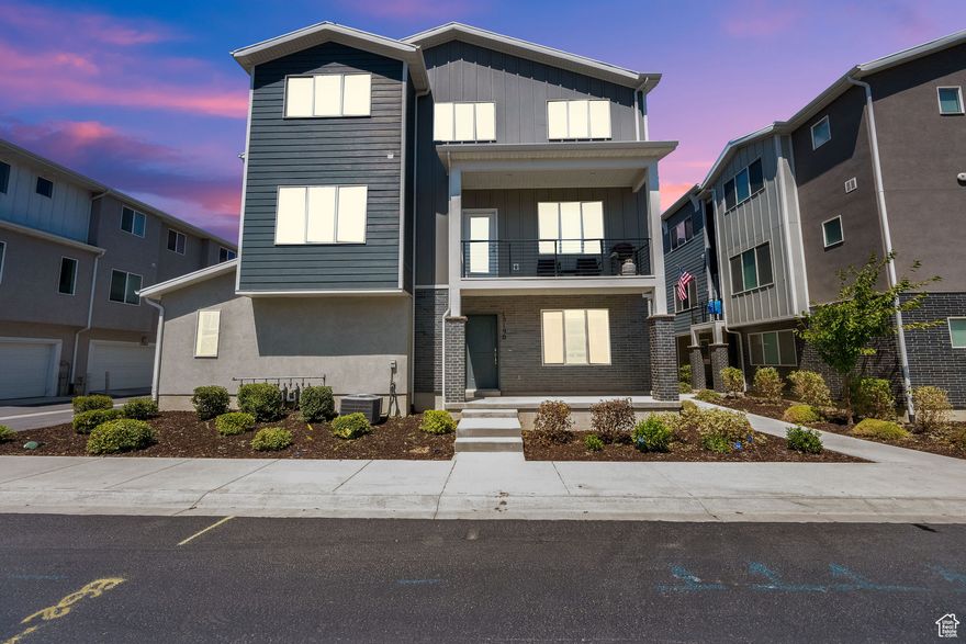 Price Improvement!    This stunning end-unit townhouse offers a unique and comfortable living experience. Featuring a range of high-end upgrades, including stacked kitchen cabinets with stylish backsplash, additional can lighting, luxury GE Platinum Cafe appliances (gas range, microwave, dishwasher), high-quality laminate flooring, open stair railings, and granite countertops, this home is designed for modern living. The primary bathroom offers a double vanity and a spacious walk-in shower.  Spacious Master bedroom with a walk-in closet. The community is packed with amenities, including green spaces, a dog park, walking/biking trails. Plus, it's just minutes from elementary and middle schools, with quick access to I-15. Don't miss out on this exceptional home! Square footage figures are provided as a courtesy estimate only and were obtained from county records.  Buyer is advised to obtain an independent measurement.