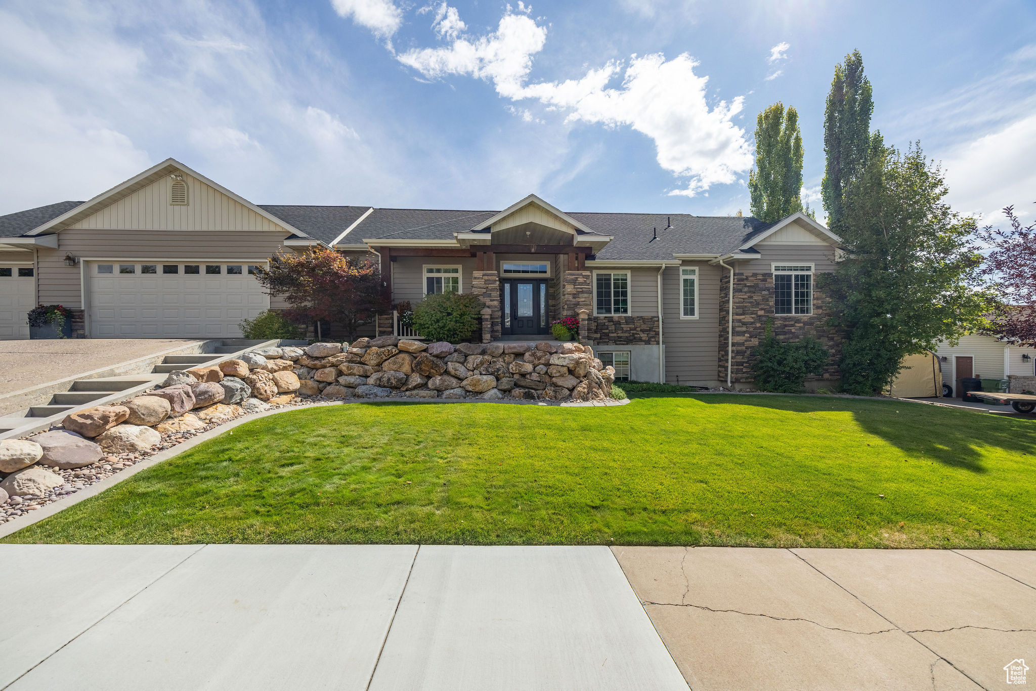 Discover this exceptional 7-bedroom, 3.5-bathroom rambler nestled in a desirable Smithfield neighborhood. Offering an impressive 6,112 sq. ft. of living space, this residence combines comfort, functionality, and style. The thoughtfully designed floor plan features multiple gathering spaces, spacious bedrooms, and abundant natural light throughout. A fully fenced yard provides both privacy and security, while the unobstructed mountain views create a truly picturesque backdrop. Agent is related to seller.
