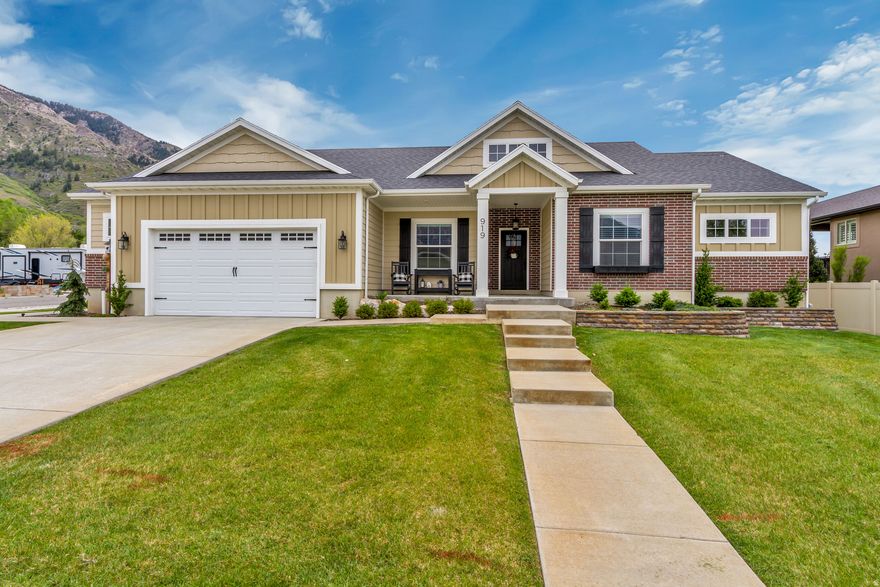 Set against the backdrop of the beautiful mountains on a quiet, secluded road, this impeccably maintained North Ogden home offers a rare blend of privacy, serenity, and refined living. Backing a large open field, the setting is as peaceful as it is picturesque. Inside, you'll find thoughtfully designed living areas with 9' ceilings, custom cabinetry, mudroom, and an oversized pantry. The spacious primary suite features a well-appointed bathroom and a large walk-in closet. Wide hallways and doorways enhance the ease of single-level living, while the beautifully manicured yard and oversized 2-car garage complete this exceptional property. Schedule your showing today!