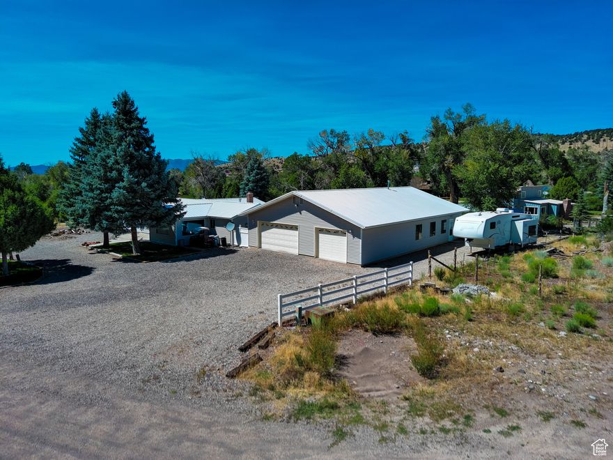 Welcome to your dream home! Nestled on a sprawling .77-acre lot, this captivating 3-bedroom, 3-bath residence offers the perfect blend of comfort, functionality, and entertainment. Whether you're looking for a peaceful retreat or a vibrant gathering space, this property has it all. With three generously sized bedrooms and three full bathrooms, this home provides ample space for family and guests alike. Each room is designed with comfort in mind, ensuring restful nights and rejuvenating mornings. Detached 4-Car Garage-Say goodbye to parking woes! The expansive 4-car detached garage offers plenty of space for all your vehicles and toys, plus extra room for a workshop or hobbies. Gather your friends and family in the large game room, complete with a pool table, state-of-the-art sound system, and a TV for movie nights or game day excitement. This is the ultimate space for entertaining! With three storage sheds on the property, you'll never run out of space for your gardening tools, outdoor equipment, or seasonal decorations. The expansive lot is perfect for outdoor activities, gardening, or creating your very own oasis. Imagine summer barbecues, bonfires under the stars, or simply basking in the sun in your spacious backyard