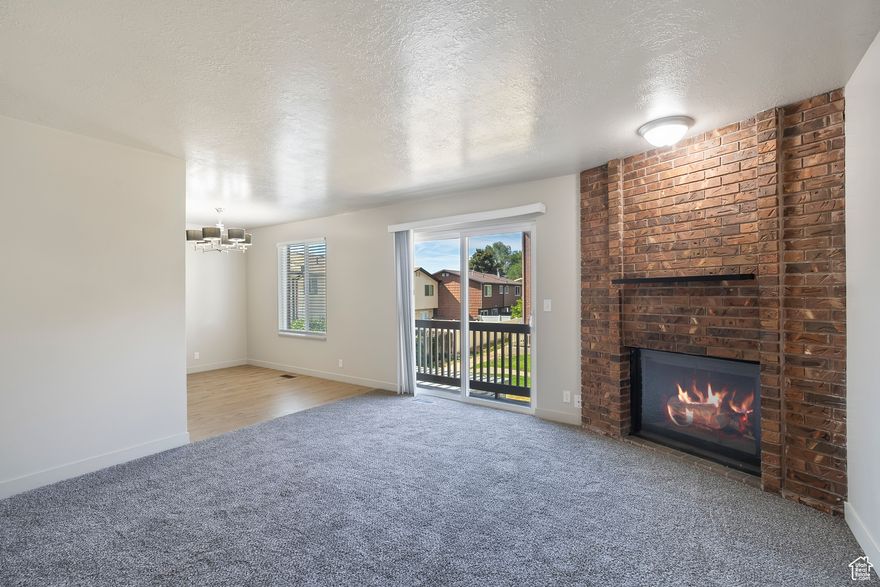 Bright, updated 2 bed/1 bath home in Roy's Kentwood Condos under $250k... Updated paint, double-pane windows, LVP flooring, granite counters, newer furnace and AC... Open kitchen flows into dining area-perfect for easy living... Spacious living room with natural light, courtyard views, and cozy fireplace... Primary bedroom with walk-in closet + in-unit laundry just steps away... Covered parking included... HOA keeps life low-maintenance, covering exterior, snow removal, water, sewer, garbage, insurance... Ideal location with quick access to I-15, FrontRunner commuter rail, and Hill AFB-commuter's dream... Enjoy local parks, Roy Aquatic Center, and trail access for weekend recreation... Convenient to shopping, dining, golf, and highly rated schools... FHA spot approval may be possible-buyer to verify... This is smart, move-right-in affordability for first-time buyers, investors, or downsizers.