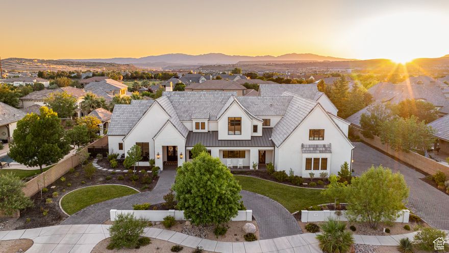 Modern luxury smart home with French LaCanche range, RV garage, indoor gym, and designer pool  Welcome to 2916 S 300 E, Washington, Utah - a one-of-a-kind luxury residence in an established high-end neighborhood, thoughtfully designed for upscale family living and unforgettable entertaining.  This spacious home offers 6 bedrooms, 5 bathrooms, and over 9,000 square feet of beautifully finished living space. Every detail has been elevated, including over $400,000 in smart home upgrades powered by a full Control4 system. Enjoy seamless control of lights, music, climate, and security through your phone or tablet. The home features surround sound in multiple zones, music throughout every room and the backyard, and automatic shades on every window.  The gourmet kitchen is anchored by a stunning French LaCanche range and outfitted with high-end fixtures and finishes throughout, perfect for serious chefs and casual family meals alike.  The backyard is a true retreat, featuring an incredible pool and spa, integrated outdoor entertainment system, and room for gatherings large or small. Inside, enjoy a custom sport court-ideal for active families.  Additional highlights include a spacious RV garage, generous storage, and a layout designed for both privacy and entertaining. Located in a quiet