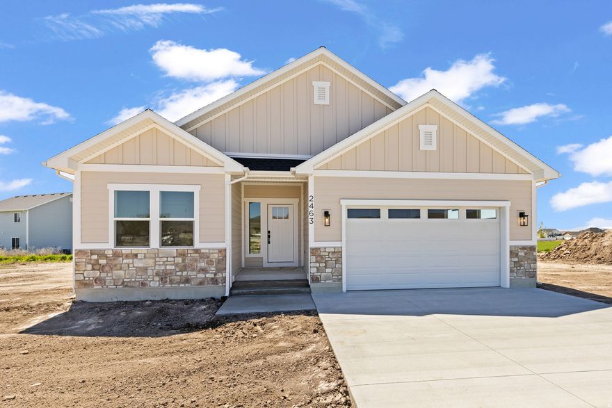 Discover this beautiful new construction home in Tremonton, perfectly situated in a quiet, welcoming neighborhood while still offering convenient access to the freeway for an easy commute. Enjoy being just minutes from everyday amenities, including grocery shopping, dining, a nearby park, and a golf course.  Inside, the home features high-quality finishes and a thoughtfully designed open concept. You'll love the custom cabinetry, quartz countertops, detailed custom trim work, and stunning ceiling-height tile that adds a touch of luxury to the space. Every detail has been carefully selected to create a modern yet comfortable living environment.  Step outside the back door to a spacious covered patio-perfect for relaxing evenings, entertaining guests, or enjoying the peaceful surroundings.  This home offers the ideal combination of style, comfort, and convenience in a desirable location. Don't miss the opportunity to make it yours!    Square footage figures are provided as a courtesy estimate only and were obtained from the building plans.  Buyer is advised to obtain an independent measurement.