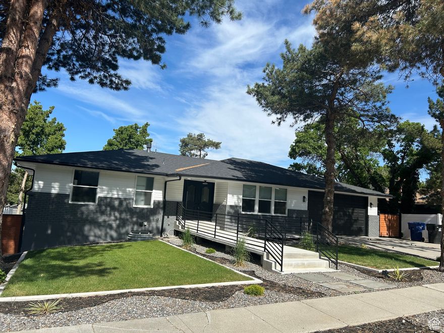 Awesome location in Cottonwood Heights between Big and Little Cottonwood Canyons! Easy access to hiking, biking and four world-class ski areas and just a quick drive to SLC International Airport. Great schools, shopping and restaurants only minutes away!  This home is turn-key and has been nicely updated and remodeled and shows like new with modern fixtures and finishes.  The lower level has a full kitchen, perfect for family, friends or guests! Amazing views, fully fenced backyard with  new professional landscape!