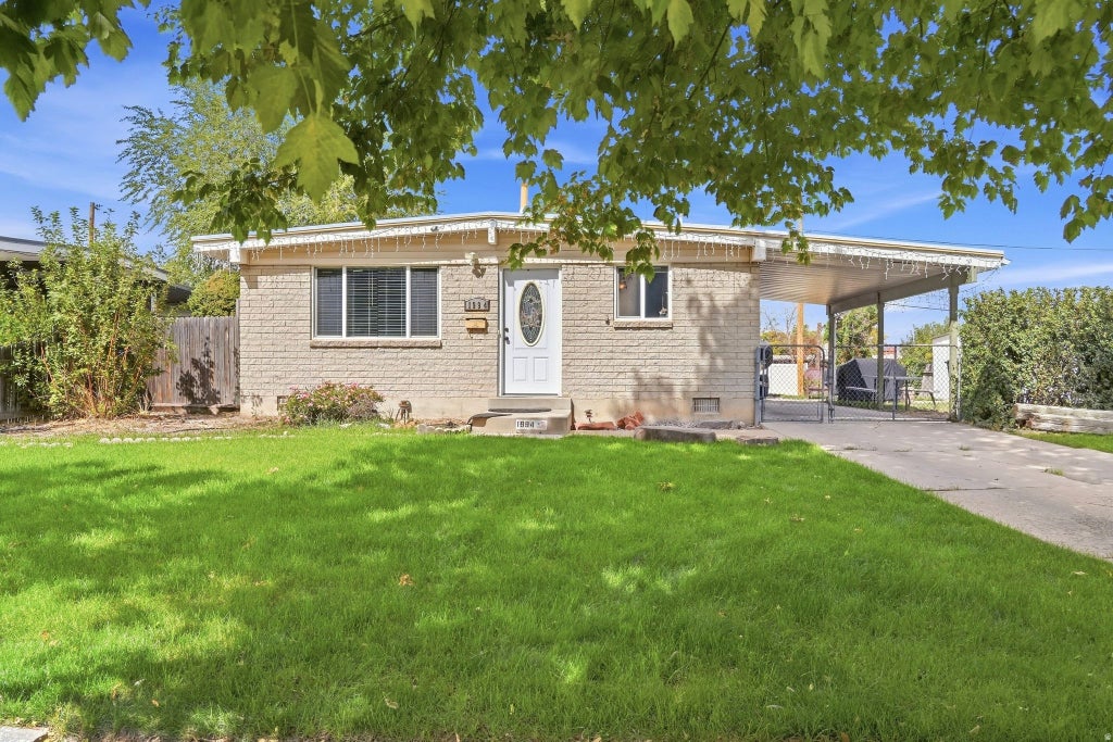 Photo of 1994 W CHAMPAGNE AVE, Taylorsville, UT 84129 (MLS # 2185805)