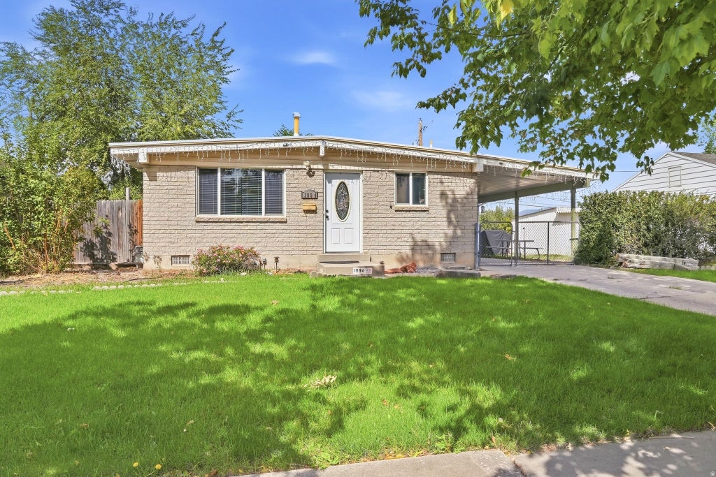 Photo of 1994 W CHAMPAGNE AVE, Taylorsville, UT 84129 (MLS # 2185805)