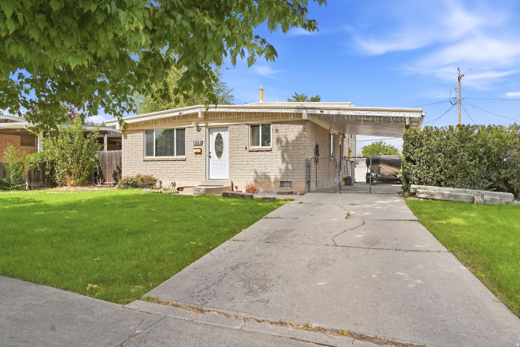 Photo of 1994 W CHAMPAGNE AVE, Taylorsville, UT 84129 (MLS # 2185805)