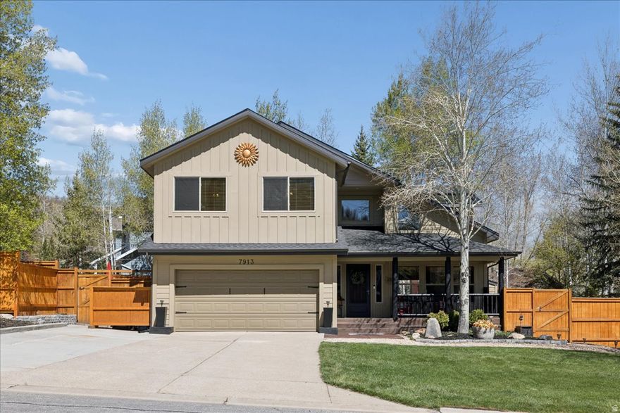 Welcome to one of Pinebrook's most distinctive offerings - a meticulously cared-for mountain home where thoughtful renovation meets effortless outdoor living. Lovingly maintained by its original owners, this 3,000+ square foot residence carries the warmth of a true Park City cabin while delivering the modern comforts today's buyers expect. The heart of this property is an extraordinary backyard entertainment complex that simply cannot be replicated. A fully covered patio anchors the space, comfortably seating a dozen or more guests year-round. The grounds are divided into two distinct zones: one side features a custom firepit area and dedicated outdoor food preparation area, the other a lush grassy lawn with built-in horseshoe mounds - perfect for hosting from Memorial Day through the first snow. Mature trees encircle the entire yard, providing exceptional shade and privacy in every season. The wide lot sets this home apart in ways that go beyond the backyard. This home features a new roof installed in 2024 with a transferable warranty, as well as newer water heaters. Two full-sized RV or trailer pads - one on each side of the home - offer rare utility for those with toys, equipment, or guests in tow. Two additional storage sheds keep everything organized and out of sight. The tasteful renovations completed over the years have refreshed the interior without sacrificing its mountain character. The result is a home that feels genuinely lived-in and genuinely loved. Located in the Eagle Ridge area of Pinebrook, you're minutes from I-80, Park City's resort corridors, and the trail systems that make this neighborhood so sought after. Whether you're entertaining a crowd or simply enjoying a quiet evening under the trees, 7913 Summerhill delivers the Park City lifestyle at its most comfortable.