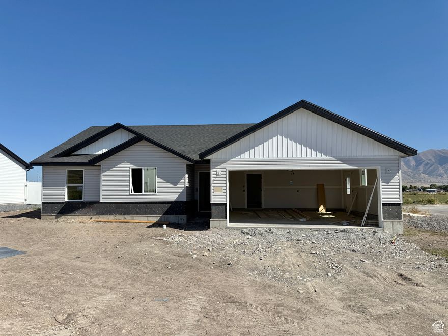 Welcome to this thoughtfully designed brand new single-level home offering 1,440 square feet of finished living space with an inviting open floor plan. The layout features a spacious kitchen with island seating, a comfortable dining area, and a bright living room perfect for gatherings. With three bedrooms and two full bathrooms, including a private primary suite, the home is designed for both functionality and comfort. A dedicated laundry room adds convenience, while the attached two-car garage with 495 square feet provides ample parking and storage. Modern finishes, efficient use of space, and a smart design make this home ideal for families, first-time buyers, or those looking to downsize without compromise.  Facing west gives you great shade in the afternoon for entertaining.