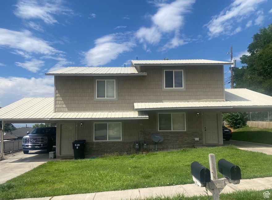 Looking for an investment?  Or maybe want someone to pay part of your mortgage?   This duplex just might be the ticket.   The home is conveniently located to schools, parks and freeway exits.   There is a ton of room for parking to the side and behind the units.   Each unit has a nice carport and each unit has two bedrooms and two bathrooms.   The back of each unit is fenced and there is a privacy fence between the units.