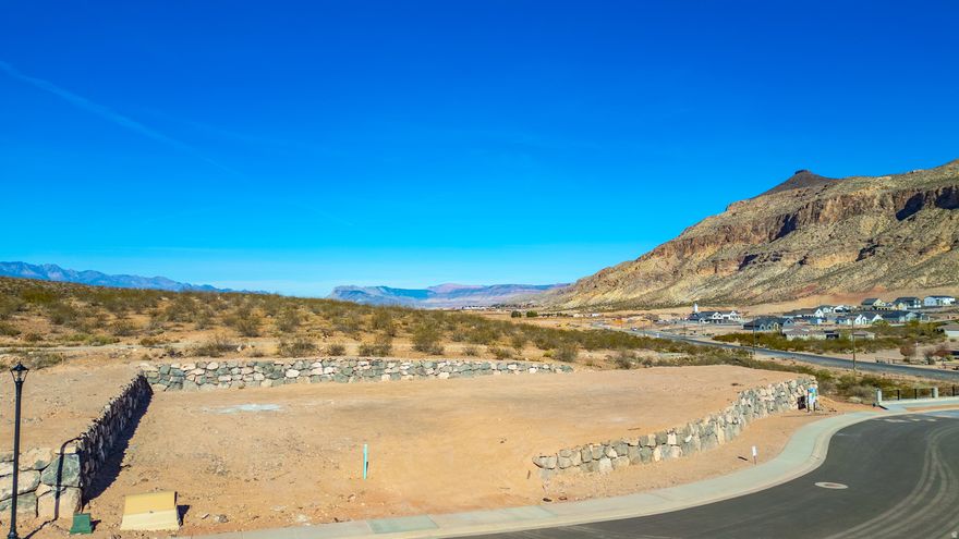 Discover The Views at Hurricane Cliffs - where modern living meets iconic Southern Utah scenery. These premium, oversized lots showcase sweeping panoramas of red rock cliffs, desert mesas, and wide-open skies. Tucked into a quiet elevated setting with direct access to world-class hiking, biking, golfing, and off-roading, yet only minutes from shopping, dining, and everyday conveniences - this community delivers the best of both adventure and comfort. Each homesite is strategically positioned to maximize privacy, views, and natural light, creating the perfect foundation to design and build your dream home. Buyers have the opportunity to work with an exclusive group of approved builders known for exceptional craftsmanship, custom design, and seamless build processes. These experienced builders are dedicated to creating homes that blend effortlessly with the landscape while capturing your personal style and vision. The Views at Hurricane Cliffs offers a rare chance to build in one of Southern Utah's most breathtaking and fast-growing areas. Come walk the lots, take in the scenery, and imagine your future home in this unforgettable setting.