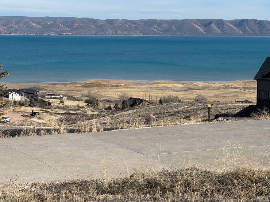 Two acre building lot in The Reserve at Bear Lake. All utilities are stubbed. Excellent views of Bear Lake, surrounding mountains and valley. The Reserve is gated, paved and has a clubhouse, two heated pools (seasonal), poolside pavilion, hot tub (year round), basketball-pickleball-tennis courts, playground, and gated BEACH ACCESS.  It also has direct access to Fish Haven Canyon for ATV/UTV, snowmobiling, snowshoeing, hiking and mountain biking. Bear Lake State Park Marina and downtown Garden City 10 min; Beaver Mountain Ski Resort 25 min.