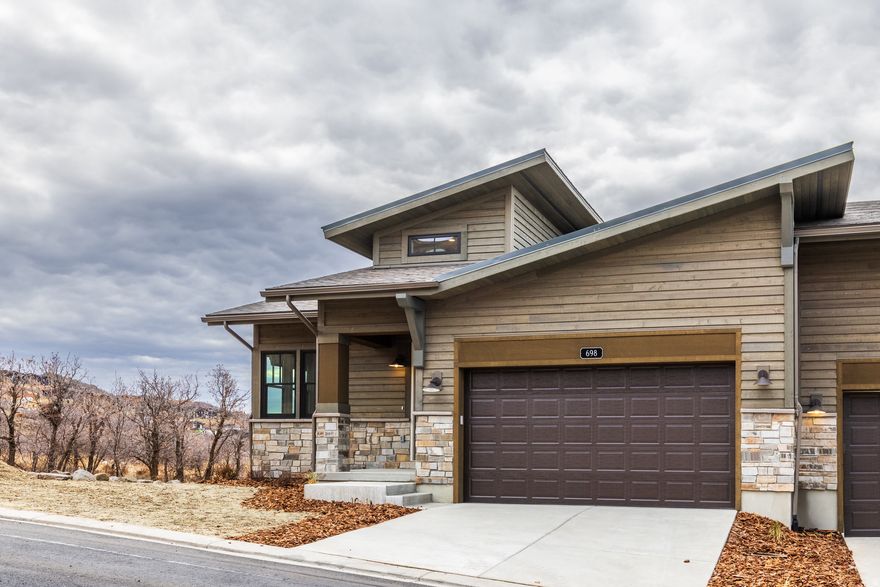 Revel in breathtaking views of Deer Valley and the Jordanelle Reservoir. Enjoy the convenience of a main-floor-living floor plan. Enjoy immediate access to hiking and biking trails right from your doorstep, and savor summer pickleball matches. Located just 5 minutes from the new East Village of Deer Valley and 10 minutes from downtown Park City, this is your opportunity to make your mountain home dream a reality. Photos are of the same plan but from a previous lot. Contact us today!