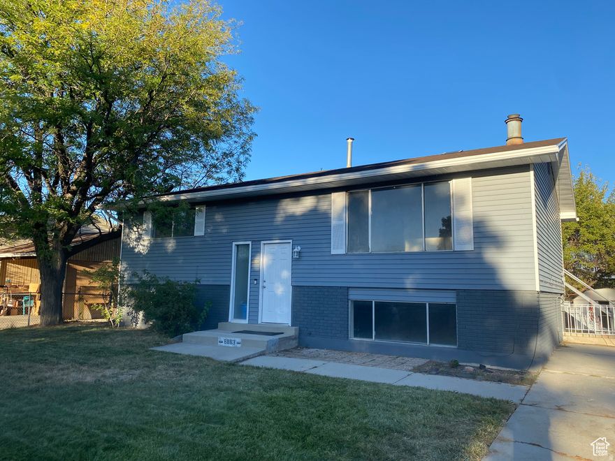 MOTIVATED SELLER, BRING OFFER.  Move-In Ready West Jordan Gem with ADU Potential!  beautifully updated home in the heart of West Jordan is ready for its next owners! Step inside to discover all-new luxury vinyl plank flooring and plush carpet throughout, paired with brand-new cabinets featuring soft-close finishes and modern LED lighting in the kitchen and dining area. Major upgrades bring peace of mind, including: A brand-new $8,000 A/C unit, New roof (within the last 2 years), New insulation (within the last 2 years) Entire home freshly repainted, top to bottom, The spacious layout offers plenty of flexibility - including a separate entry that could easily work as an ADU unit, guest suite, or private home office. The large backyard is perfect for kids to play or for entertaining, and with ample parking for multiple cars plus an RV, you'll have room for it all. Located just steps from Jordan Landing and minutes from Bangerter Highway, you'll enjoy unbeatable convenience for shopping, dining, and commuting. Don't miss your chance to call this West Jordan beauty home! ONE OF THE SELLERS IS AN OWNER AGENT/ some photos are AI staged as noted.