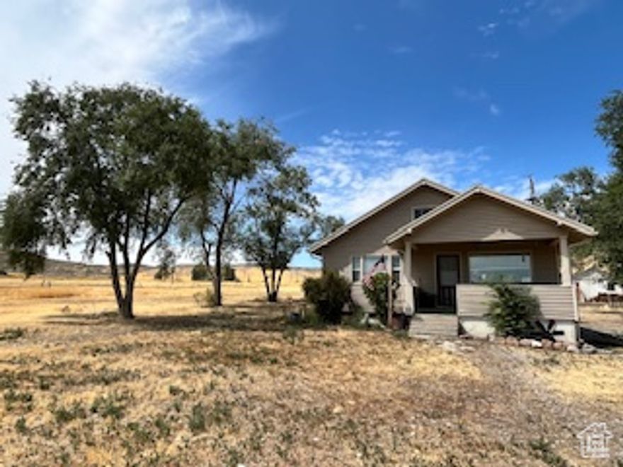 Great livestock property available. Water is also included so it can be irrigated. There are 11.29 water shares and .45 acre feet of water included. It has been farmed in the past, but not in the last several years. The septic system is 4-5 years old, and the house has been well maintained.  Square footage figures are provided as a courtesy estimate only and were obtained from county records.  Buyer is advised to obtain an independent measurement.