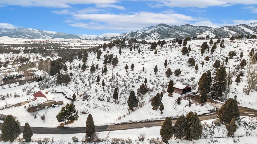 .83 acres just outside Soda Springs with livestock permitted. This is usable ground with natural slope and contour. It lays the way this valley lays, giving it character and good drainage. Set up for a small barn, a few animals, or keep it simple and build when you are ready. There is enough ground here to make it practical without taking on more than you want to manage. Close to town for feed, fuel, and groceries, but far enough out to feel rural.