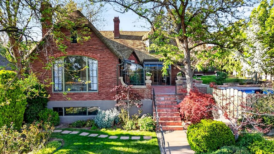 Amazing home on 11th Ave - full of quality, character, and yesterday's charm... plus a rare three-car garage, pool, studio/workshop space, and a basement apartment with separate entrance! This very special home has been lovingly cared for over the past 60 years. Built in 1927, it beautifully preserves its original integrity and craftsmanship without compromise. From the moment you walk in, the welcoming feeling is incredible - the charm simply wraps around you. The Tudor-Cottage architectural design is stunning, and the outdoor spaces are perfect for entertaining, relaxing, and enjoying every season. Wait... this is starting to sound like an infomercial - but there's more! This is truly a one-of-a-kind property you have to experience in person. Come and see!