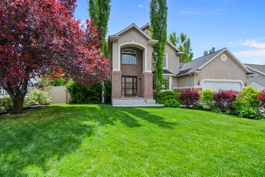 A Remodeled Custom Home Builder's Personal Residence can serve as a Multi-Generational Home or a High-End Income Property. A stunning walnut entry door with vecchio glass & oversized office doors sets a professional tone. Designer upgrades include natural stone counters, euro cabinetry, 3-zone HVAC system, engineered hardwood floors, cased windows with headers, and upgraded trims & moldings throughout. Features a new roof (2025), new driveway (2024), Jellyfish Lighting, Heated Garage with Epoxy Floors, RV pad, and a Covered Patio with an In-Ground Trampoline. 5 bedrooms + office +formal living room, 4 bathrooms, 2 full kitchens, and 2 laundries. The basement apartment includes a separate entrance, a 2-bedroom suite, a kitchen, laundry, and Fort Knox vault storage. This home has it all and can be your forever home!