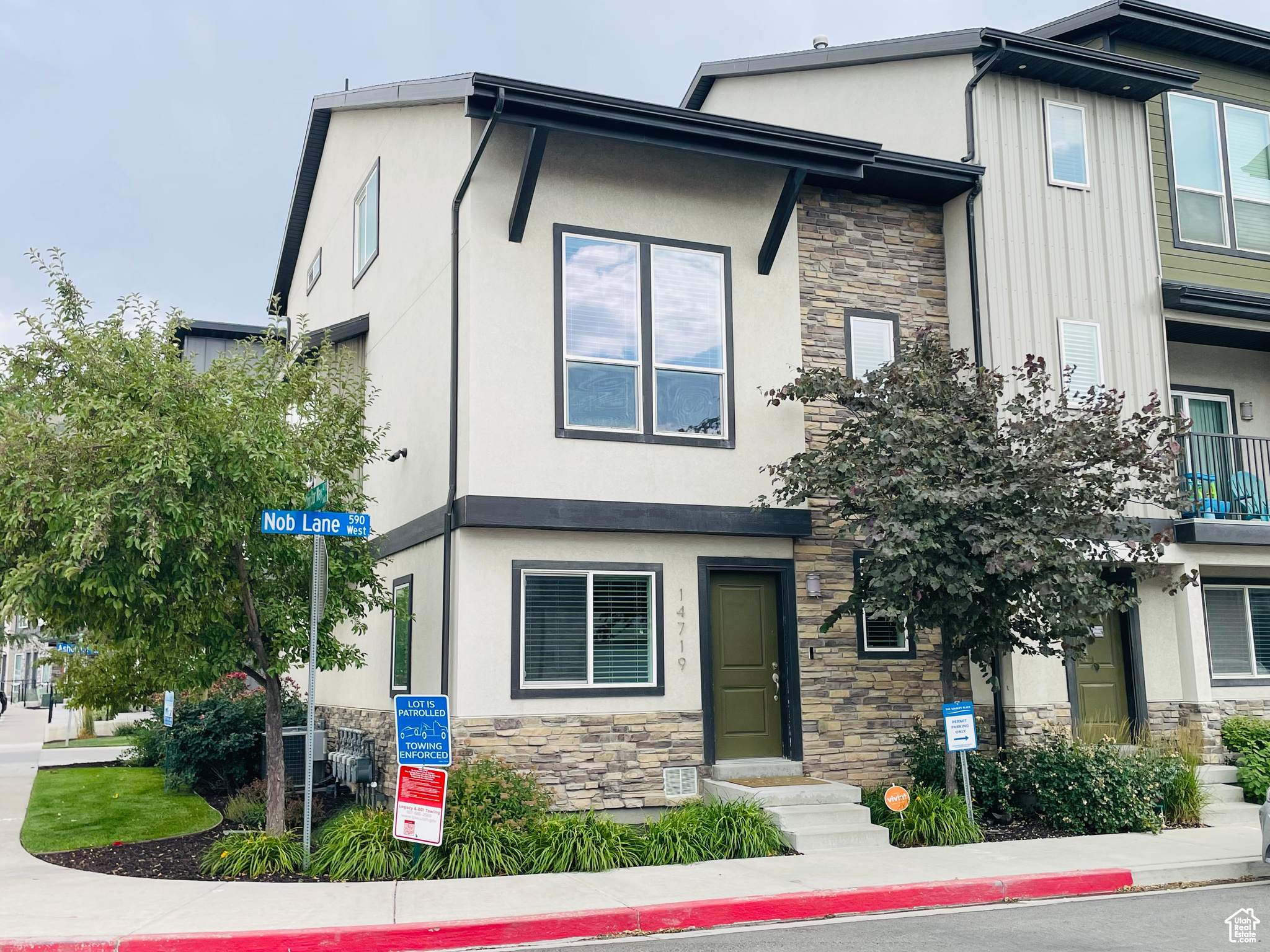 Beautiful and spacious end-unit townhome located in Bluffdale's premier subdivision, Marketplace at Independence. This well- designed home features 4 large bedrooms, 4 bathrooms, two family rooms, and two laundry areas-ideal for multi-generational living, guests, or rental flexibility. With tall ceilings, large windows, and a bay window offering expansive views, the home is filled with natural light across all levels. Two generous gathering spaces make entertaining easy, and the attached 2-car garage provides ample room for vehicles and storage. The community offers quick access to I-15, nearby parks, paved trails, and entertainment. With ongoing growth in Bluffdale and the nearby development of "The Point" in Draper-featuring future parks, shopping, dining, tech hubs, and transit-this location presents both lifestyle and investment opportunity. Square footage figures are provided as a courtesy estimate from builder specs; buyer is advised to obtain an independent measurement. Seller is related to the agent. Buyer to verify all information, including rental rules with HOA.