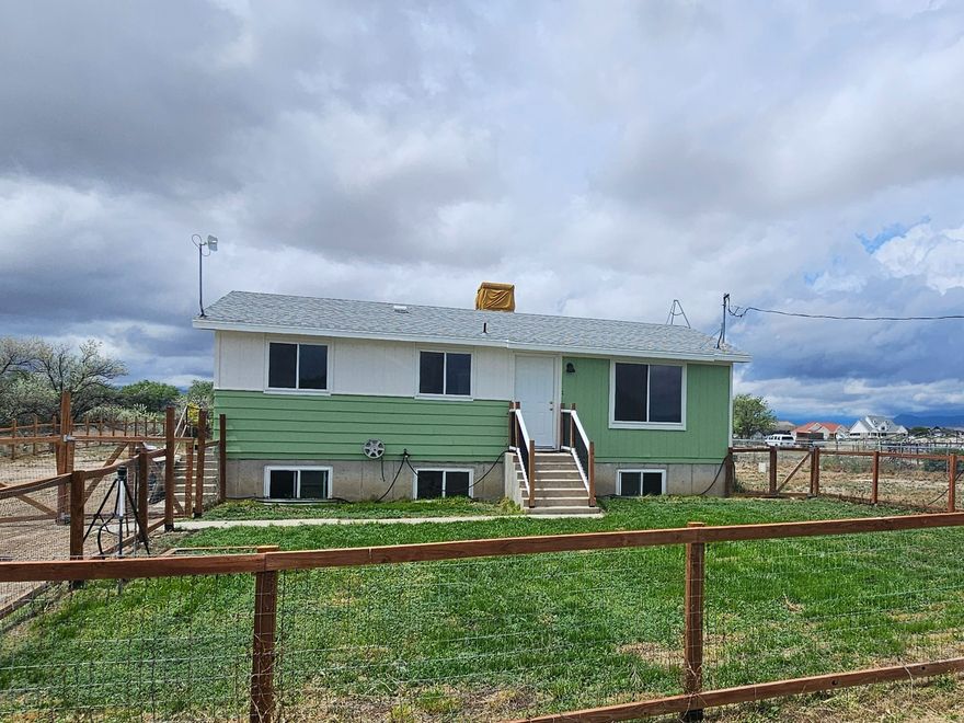 Charming 2-bedroom, 1 bathroom home situated on 0.58 acres in Price, Utah. More room to grow in basement; this location is quite out of town but close enough for everything minutes away from downtown. This property offers a spacious fenced yard with plenty of room for animals, gardening, RV parking, or future improvements. Inside features a bright kitchen with ample cabinet space, comfortable living areas, and updated flooring throughout portions of the home. Enjoy peaceful views and country-style living while still being conveniently located near town amenities. Great opportunity for a starter home, investment property, or anyone looking for extra outdoor space.