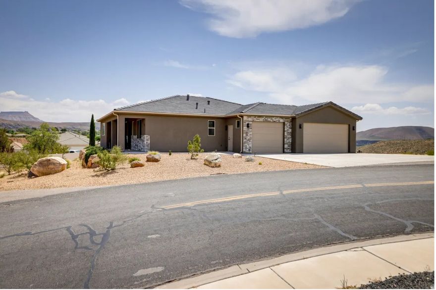 STR approved!!!! Opportunity awaits to purchase a turn key-cash flowing short term rental which is close to Zions Gateway or purchase as your primary home! Everything is included in the sale. It has the potential to be 3 SEPARATE Units. It has 3 kitchens, 4 bathrooms, a master suite, 3 sets of washer and dryers, 2 car garage, 12 ft ceilings, Bosch appliances. 1/2 acre lot with lots of parking including trailers. It has amazing views! Buyer to verify all information.