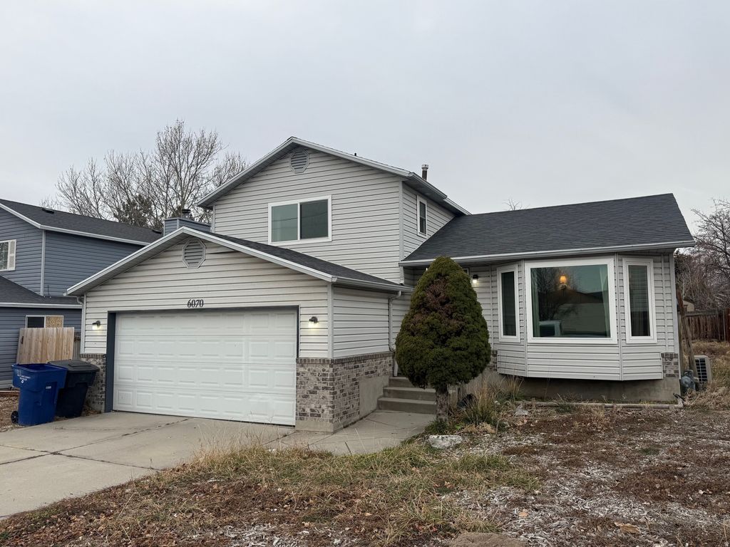 Photo of 6070 S COUGAR LN, Kearns, UT 84118 (MLS # 2143726)