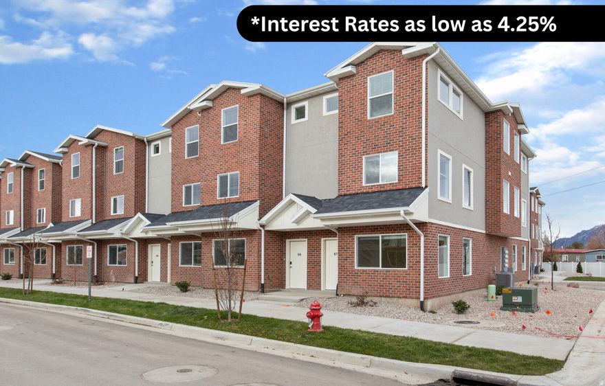 This is your chance to own a Brand-new home for less than you think! Ask about our Interest Rate incentives allowing you to lock-in rates as LOW AS 4.25%. This end-unit townhome is filled with natural light, creating a bright and inviting space throughout. Featuring three large bedrooms, two and a half bathrooms, granite countertops, stainless appliances, luxury vinyl flooring, smart home features (thermostat/door locks /lights), and attached garage. Open-concept living spaces offer the perfect blend of comfort and style, ideal for relaxing at home or entertaining guests. Located just minutes from shopping, restaurants, and I-15, The Villas at the Point is right where you want to be. Outdoor swimming pool, playground and Clubhouse to be completed in 2026. HOA includes high speed internet, garbage, sewer, insurance and smart home systems. Buyer to verify all listing information.