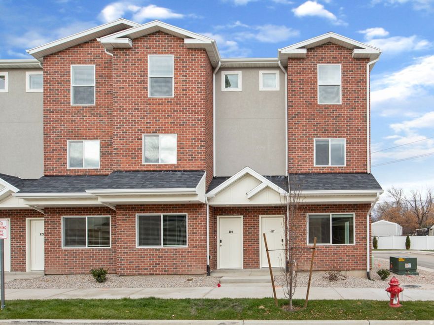 This bright and spacious end-unit townhome is the perfect opportunity for first-time buyers to own new in Ogden at an affordable price point. With extra natural light and added privacy, this 3 bedroom, 2.5 bathroom home features an open-concept layout, granite countertops, stainless steel appliances, luxury vinyl flooring, smart home tech, and an attached garage. Located just minutes from I-15, shopping, and dining. The Villas Community will include an outdoor pool, clubhouse, and playground to be completed this year. The HOA covers internet, sewer, water, garbage, insurance, and smart home services. Move-in ready and designed for low-maintenance living. Map Coordinates: 411440.6"N 1115911.2"W. (Next to El Paisa Grill Restaurant). Buyer to verify all information.