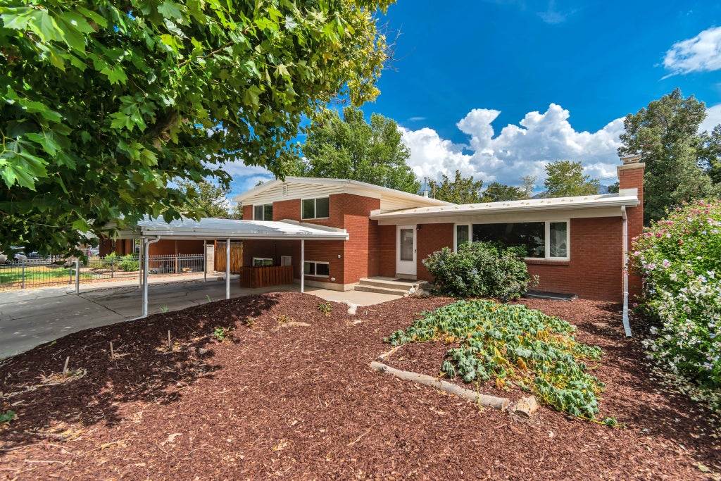Photo of 9297 S SNEDDON DR E, Sandy, UT 84070 (MLS # 2180929)