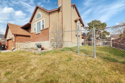 Photo of 5890 W SWANBRIDGE DR S, Kearns, UT 84118 (MLS # 2143196)