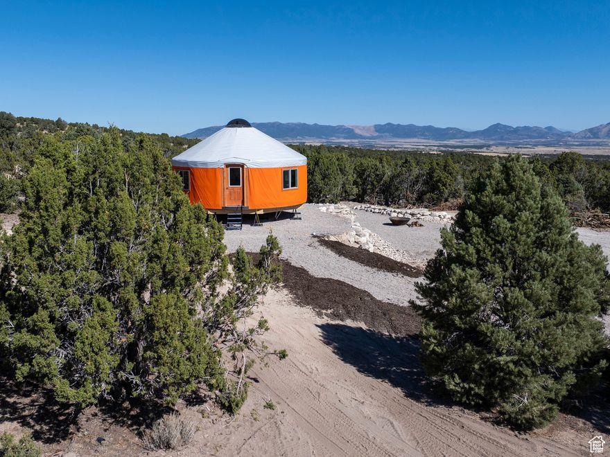 Seller Financing Now Available From the demands of everyday life. Imagine owning your own personal piece of Little Sahara! These spacious 5- or 10-acre parcels provide plenty of room to feel like you're in your own world. Each lot comes equipped with a firepit, surrounded by tall junipers, cedars, and sagebrush, enhancing the natural beauty and privacy. The property borders BLM land, offering hundreds of miles of off-road trails for both vehicles and single-track exploration. With a gentle slope, every lot offers breathtaking views of nearby mountain peaks and sweeping valleys. GPS Directions to the Little Sahara can be found below. Latitude and Longitude is here... 39.850594, -112.295142. Just enter those into Google Maps for the best directions. This is raw land and no new water appropriation is being done in this section. Any personal property pictured in the photos, other than the firepits, are not included with the sale. No Mineral Rights are Included. Map to Little Sahara is here... https://maps.app.goo.gl/Bk697d1QehX5FX9G6. *All property information, boundaries and documents to be verified by buyer.