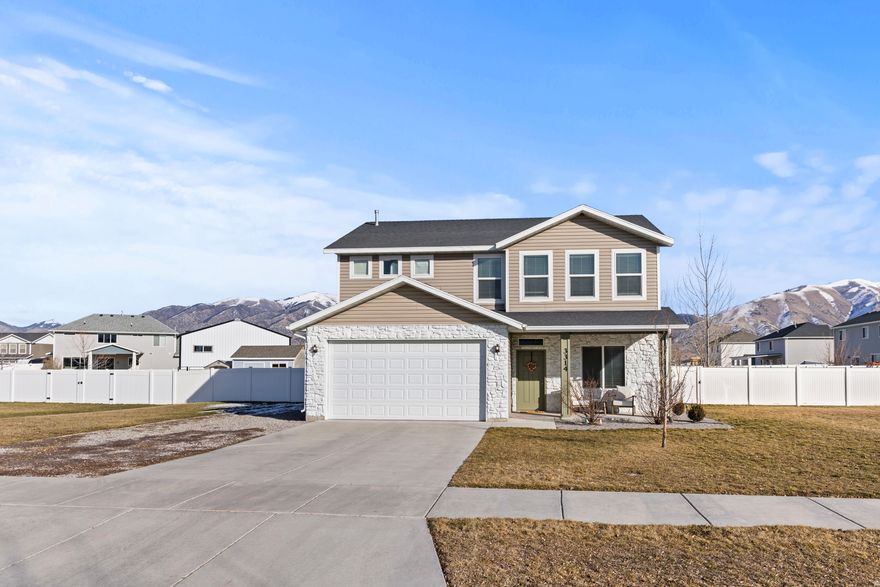 Enjoy the small-town feel Cache Valley is known for in this updated Nibley home, located on a quiet street with mountain views from both the front and back. Over the last year, the home has seen extensive updates, allowing the next owner to move in and enjoy it from day one. Improvements include new quartz countertops, new sinks and faucets, all new appliances, updated lighting throughout, LVP flooring across the entire main floor, and new carpet throughout the rest of the home. The open great room with 9' ceilings offers a bright, functional layout, complemented by a separate formal living room or office. The primary suite features a walk-in closet, soaker tub with tile surround, and private water closet. Set on a west-facing 0.37-acre lot, the home offers shaded evenings on the back patio, a fully fenced backyard, full auto sprinklers, mature landscaping, and RV parking. Conveniently located near parks, trails, schools, shopping, and just minutes from Logan, this home delivers modern updates, space, and the Cache Valley lifestyle that you are looking for. Call today for your private showing!
