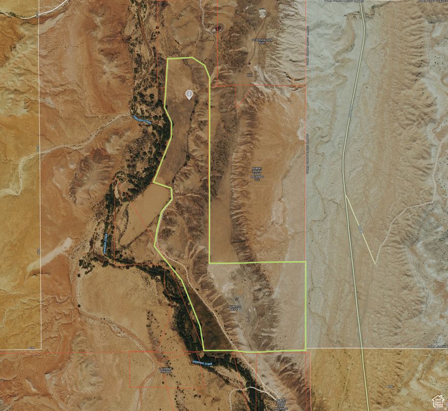 Welcome to this remarkable 69-acre property, offering breathtaking 360-degree views of the stunning Capitol Reef National Park. This picturesque piece of land is an incredible investment opportunity, with endless potential for income-generating ideas. Whether you're looking to develop a glamping site, create a tiny home community, or pursue other ventures, this property is a blank canvas for your imagination to run wild. The expansive and serene landscape provides the perfect backdrop for any business venture or a peaceful retreat. The possibilities for this land are endless, and the views are truly awe-inspiring. Imagine waking up every day to the majestic beauty of Capitol Reef National Park, and basking in the tranquil silence of the desert. The location is also perfect for outdoor enthusiasts, with easy access to hiking, rock climbing, and exploring in the surrounding wilderness. This is a once-in-a-lifetime opportunity to own a slice of paradise, and make your dreams a reality. Don't hesitate, and come see for yourself why this is the perfect place to create a desert retreat.