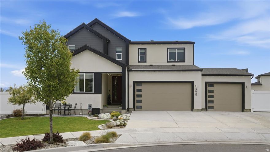 Better than new construction! This beautifully upgraded 2021 Garbett home combines thoughtful design and functionality throughout. The customized kitchen showcases premium full length cabinets, large pantry, gas range, wall oven and microwave. The main level offers a versatile bedroom or flex space with a full bath, perfect for guests, office, or multi-generational living. Upstairs you'll find a spacious primary suite with ensuite, two additional bedrooms and a loft area with potential for future bedroom. The finished basement expands your living options with a kitchenette, two bedrooms, a full bathroom, and flex space. A large yard designed for enjoyment, featuring multiple patio areas, an expansive concrete entertaining space, RV parking, and full-perimeter Govee lighting.  Additional conveniences include a man door from the garage for easy backyard access, a garage utility sink, overhead storage racks, and outdoor shed. Custom top-down/bottom-up window coverings throughout provide both privacy and natural light control, completing this truly move-in-ready home. Square footage figures provided as a courtesy, obtained from county records. Buyer is advised to obtain an independent measurement.