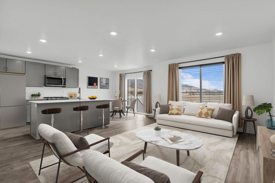 One of the most affordable townhomes in the area, this beautiful property offers the perfect blend of comfort, functionality, and stunning mountain views. The well-designed layout features a convenient 2-car garage, a private back patio perfect for relaxing or entertaining, and an unfinished basement with excellent potential to add additional living space and build equity over time. The primary bedroom overlooks a large open field behind the home, providing peaceful views and added privacy.  Located in a vibrant master-planned community, residents enjoy outstanding amenities including a pool, clubhouse, pickleball court, small dog park, walking pathways, and two parks. The community also features over 50 miles of jogging, cycling, and horse-riding trails, along with access to a large all-abilities regional park, mountain bike park, skate park, and an extensive ATV trail system spanning more than 85 miles.  This safe, growing city offers the perfect balance of outdoor recreation and a welcoming small-town feel, making it a wonderful place to call home.