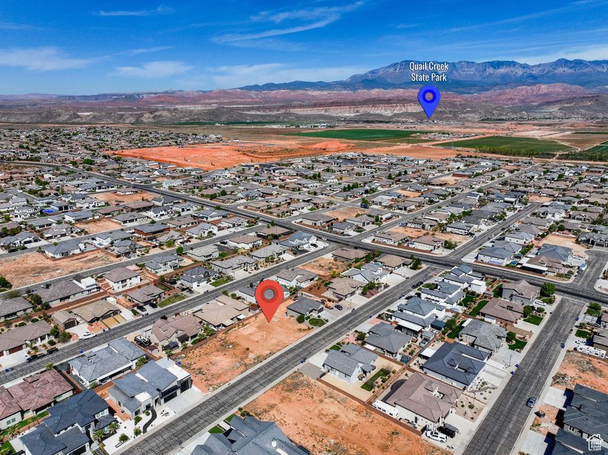 Build your dream home on this spacious .25-acre lot in the desirable Dixie Springs community, just 3 minutes from Sand Hollow Reservoir and steps from Dixie Springs Park! Partner with T3 Homes (t3homes.org) to create a custom home tailored to your vision with the opportunity to choose your ideal floor plan and finishes on this prime lot. Enjoy nearby access to boating, fishing, UTV trails, and walkable amenities like a splash pad, soccer fields, pickleball courts, and more, all with no HOA! Embrace the Southern Utah lifestyle in a vibrant, recreation-focused neighborhood. Photos include potential digital renderings by T3 Homes, visit their website for more inspiration. Boundary lines are approximate. Buyer to verify all information, deemed reliable, however buyer to verify all info including utilities, rental restrictions, and HOA information if applicable.