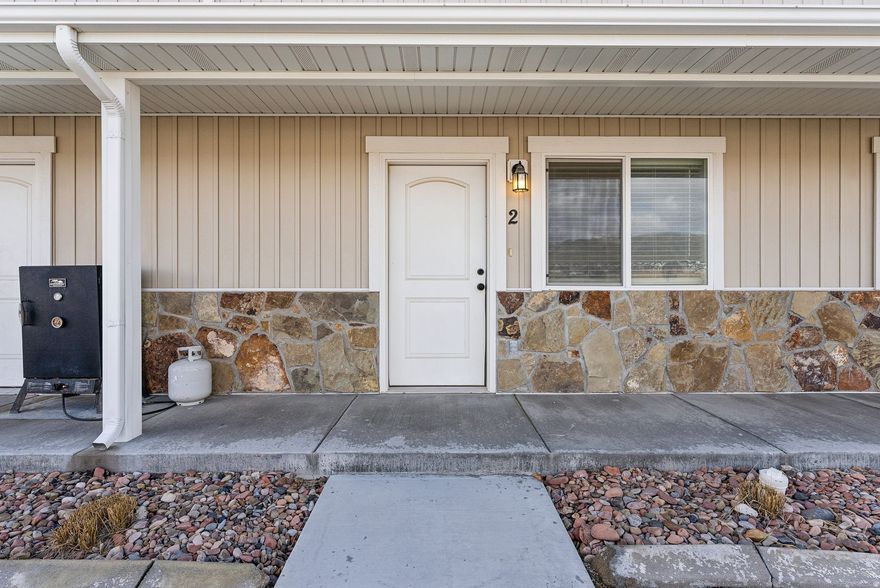 Discover this turn-key townhouse nestled in the River Valley subdivision. A bright open main level featuring granite countertops, knotty alder cabinets, sleek finishes and easy flow.  2 spacious bedrooms upstairs with a full bath; guest half bath and laundry on the main floor.  The building is at the end of the complex and offers ample green space and a front porch with mountain views. The seller has added high-speed internet for fast connectivity.  All appliances are included!!  USDA-eligible financing may make this home accessible with lower down payment.  HOA dues of $99/month have never increased during the sellers ownership.  Whether you're looking for your first home, investment opportunity, or a simplified living option - this property delivers modern comfort, smart value, and a great location. Close to I-15, yet tucked away off a busy road. Come see why this townhouse offers the best value, with more open space.